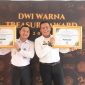 Kakanwil Kemenkumham jabar Masjuno menyabet dua penghargaan pada ajang Dwi Warna Treasury Award 2024.