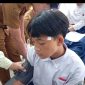 Siswa saat dilakukan penanganan medis oleh puskemas.